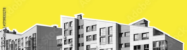 Fototapeta Modern residential building in minimalist style with geometric roof lines, black and white facade,