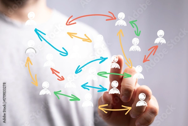 Fototapeta Visual of a hand interacting with a network of people, symbolizing connection and collaboration.