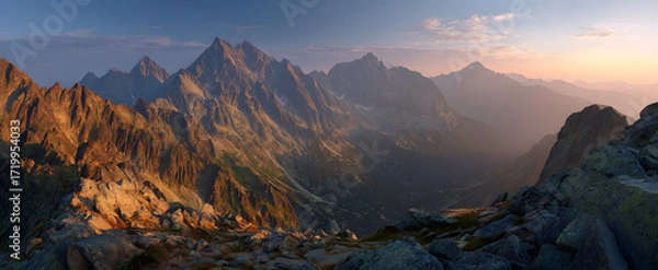 Fototapeta sunset over the mountains