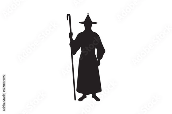 Fototapeta Silhouette of a wizard holding a staff and wearing a pointed hat