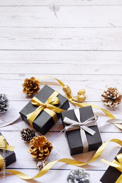 Fototapeta Christmas gift boxes and decorations on wooden table. Preparation for holidays. Copy space. Christmas background.