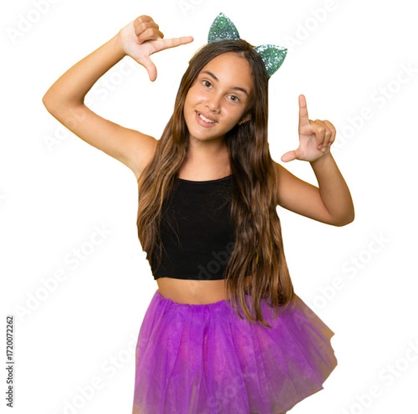 Fototapeta Happy child girl celebrating Halloween making frame gesture standing isolated over transparent background.