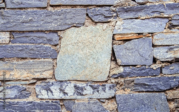 Fototapeta Dark grey slate stonewall detail, background with plenty of space for your text and logo