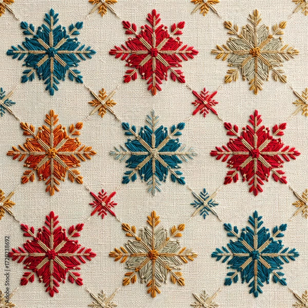 Fototapeta Warm embroidered geometric snowflake fabric pattern