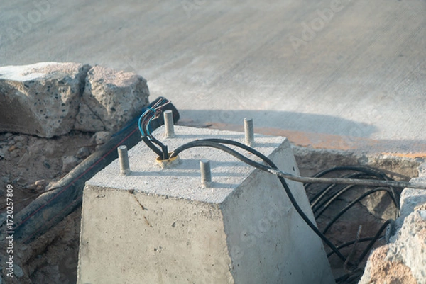 Fototapeta Concrete Base with Electrical Cables Visible
