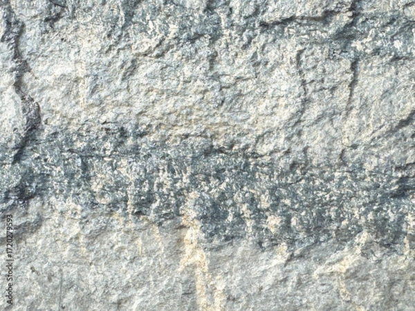 Fototapeta Textured gray rock surface with natural rough patterns and details