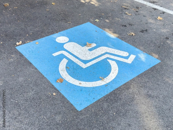 Fototapeta Accessible parking space symbol on asphalt