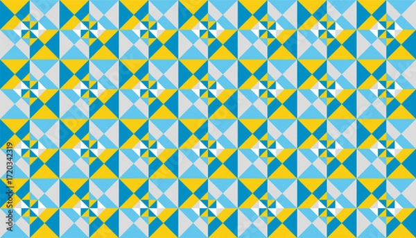 Obraz Seamless geometric pattern with blue, yellow, and white star-like shapes forming a bright modern abstract background