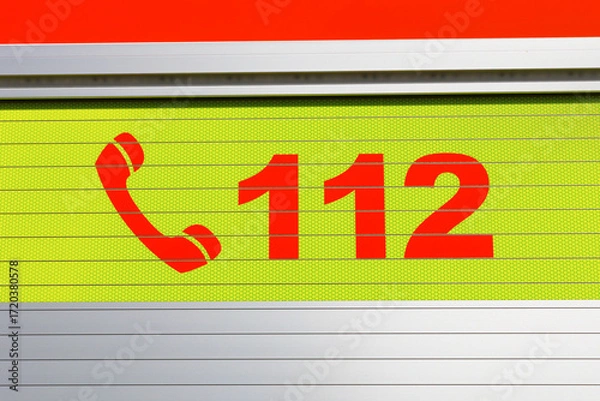 Fototapeta 112 - European emergency telephone number. Detail on bright colorful surface.