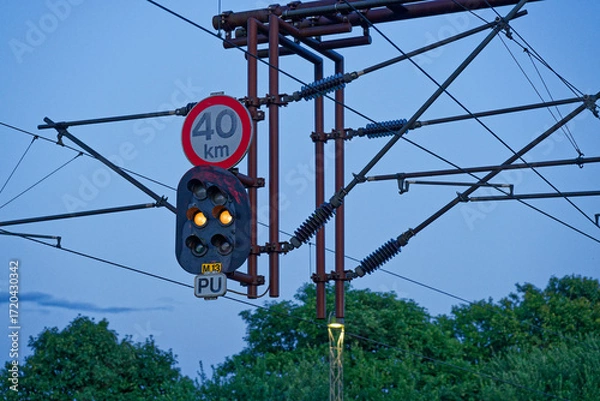 Fototapeta Railway signal shows yellow and speed limit 40 kmh in Padborg, Denmark