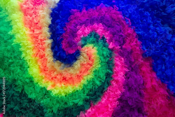Fototapeta Colorful multi-colored spiral pattern of the rainbow made of fabric