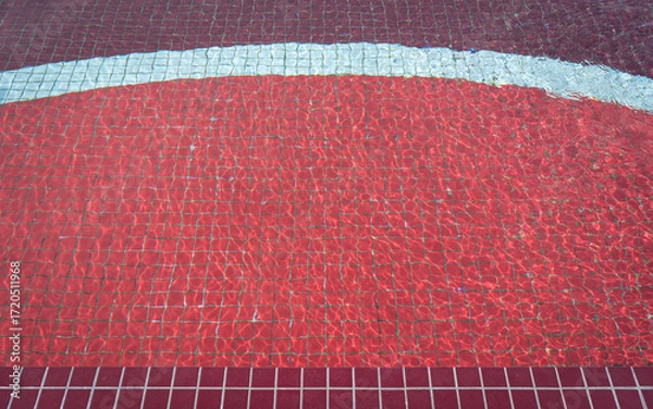 Fototapeta Red Swimming Pool Water with Tile Pattern. Top view.