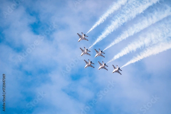Obraz Air show planes flying in formation in blue sky