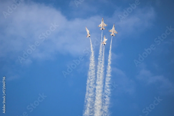 Obraz Air show planes flying in formation in blue sky