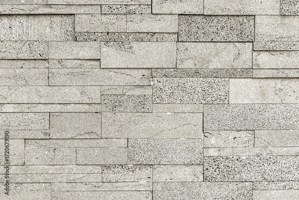 Fototapeta Seamless pattern of grey interlocking rectangular stone tiles