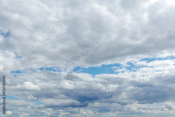 Obraz Blue sky with dramatic white clouds