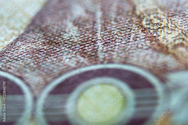 Fototapeta Detailed Close-up of Currency with Textures and Patterns in Focus