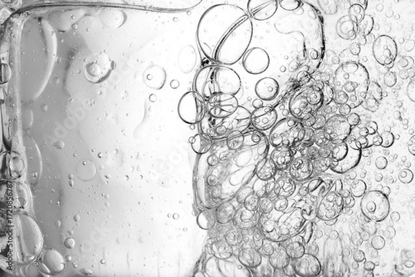 Fototapeta Oil with bubbles abstract background. Soft selective focus.