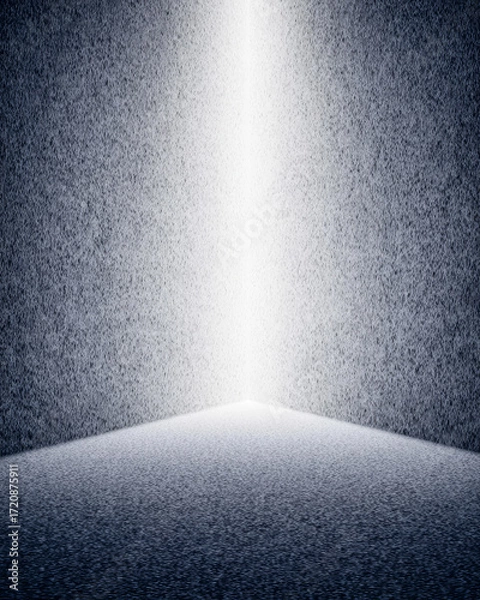 Fototapeta Light breaking through a dark space creates a dramatic atmosphere in a minimalistic setting