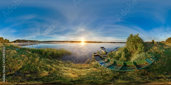 Obraz 3D spherical panorama with 360 viewing angle. Ready for virtual reality or VR. Full equirectangular projection. Sunrise at the bank of lake. Boats on the bank of lake.