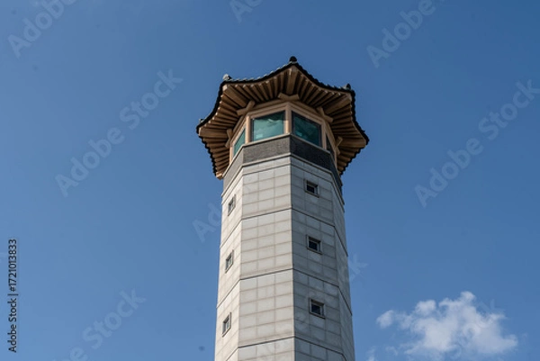 Fototapeta Cityscape and natural view from an observation facility, offering a wide perspective from a high vantage point.