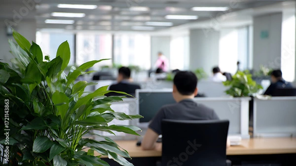Fototapeta Blurred image of business people working in office. Corporate environment, teamwork, and business concept.