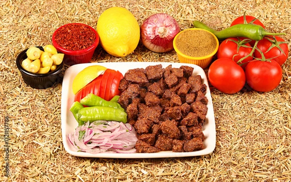 Fototapeta A lamb liver portion with fresh vegetables