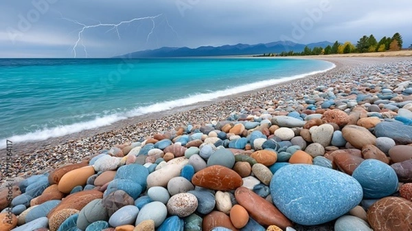 Fototapeta Dramatic Seascape with Lightning Over Turquoise Ocean and Rocky Shoreline View