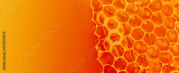 Fototapeta Honeycombs with sweet golden honey as background, close up. Abstract Background texture and pattern of wax honeycomb with gradient ombre blend blur flow fluid.