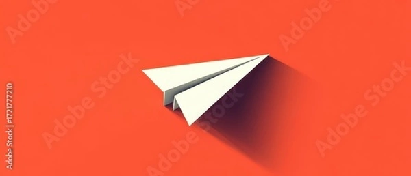 Fototapeta Paper airplane on vibrant background symbolizing creativity and innovation.