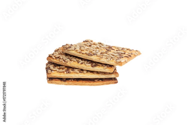 Fototapeta Stacked flax and sunflower seed cookies isolated on a white background are perfect for snack branding, packaging visuals, or baked goods advertising.