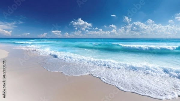 Fototapeta The Stunning Beach Scene with Lapping Waves and Clear Blue Sky