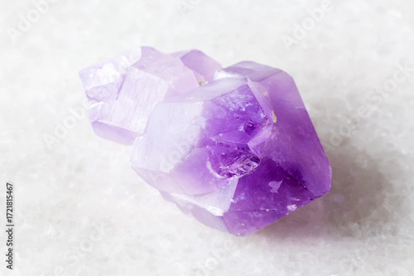 Obraz sample of rough amethyst crystals on white marble