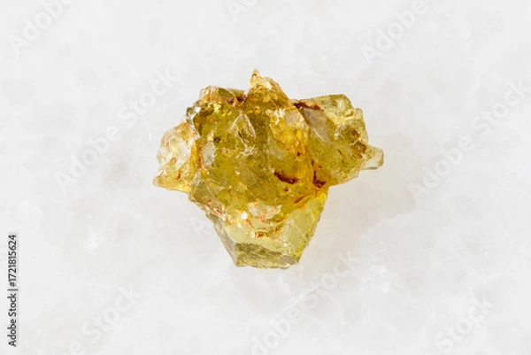 Obraz sample of raw sinhalite mineral on white marble