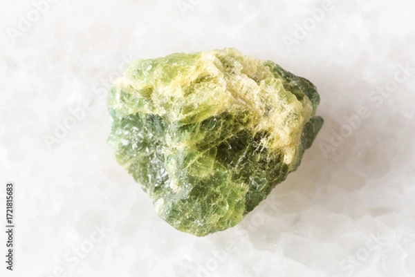 Obraz sample of raw yellow green beryl mineral on white