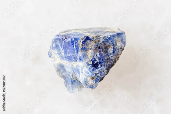 Obraz sample of raw benitoite stone on white marble