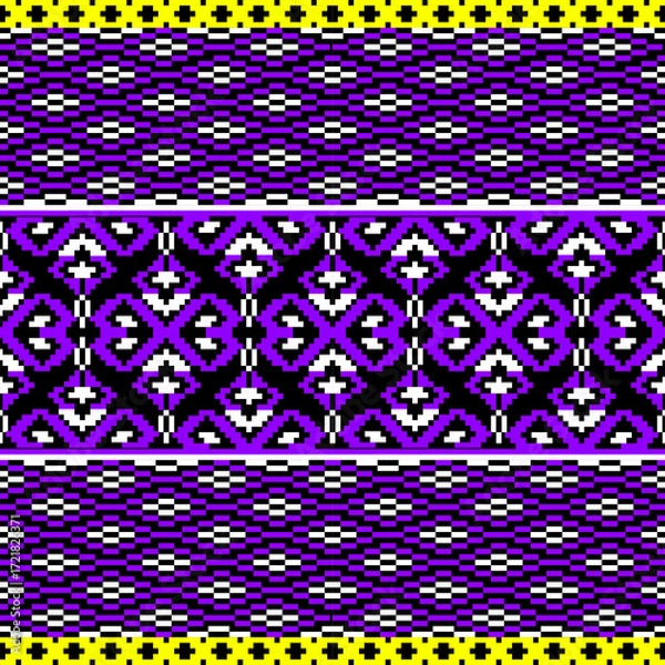 Obraz black and white pattern
Pixelated ethnic textile pattern featuring symmetrical horizontal bands with diamond and cross motifs in purple, black, and white. Accented with yellow borders and traditional 