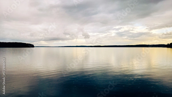 Fototapeta clouds over the lake