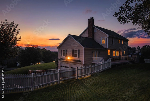 Fototapeta Colonial house sunset