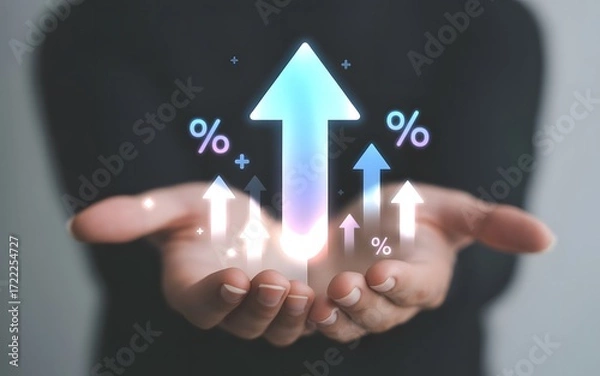 Fototapeta Hands holding glowing upward arrow and percentage signs symbolizing growth