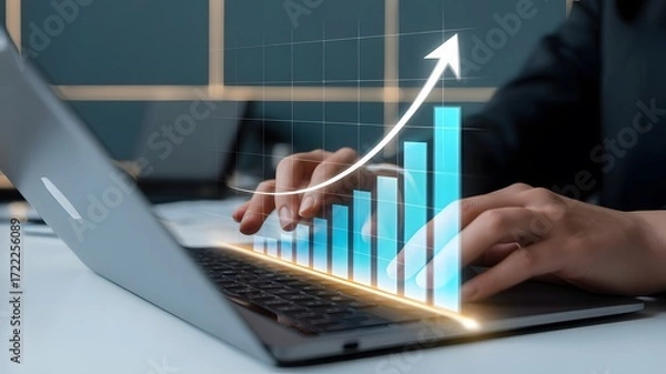 Fototapeta Business growth and success with rising financial chart on laptop screen