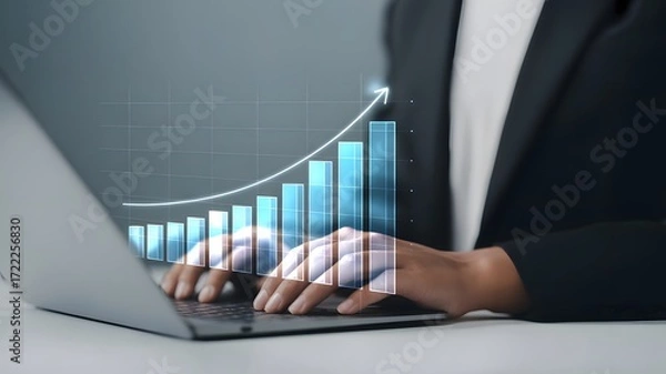 Fototapeta Business professional analyzing financial growth chart on laptop computer