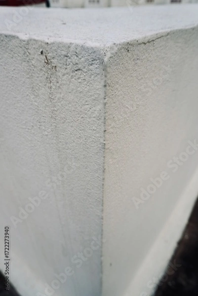 Obraz Top view of white painted concrete block showing cracks and marks