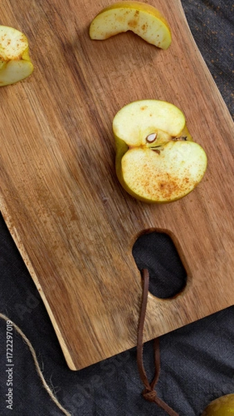 Fototapeta Apples on a Table with Cinnamon