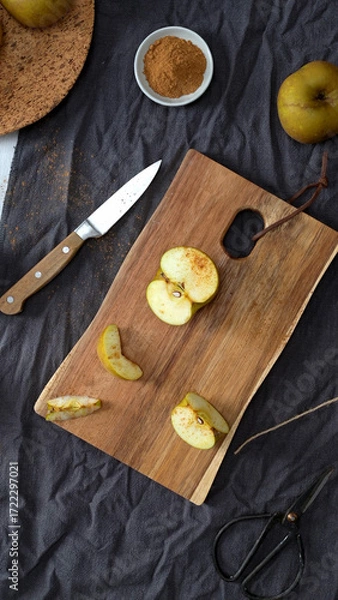 Fototapeta Apples on a Table with Cinnamon