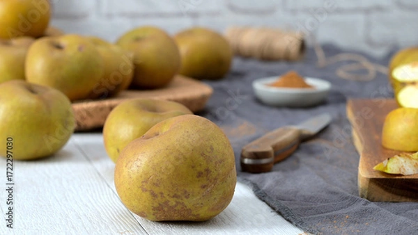 Fototapeta Apples on a Table with Cinnamon