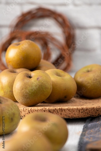 Fototapeta Cozy autumn scene with rustic apples