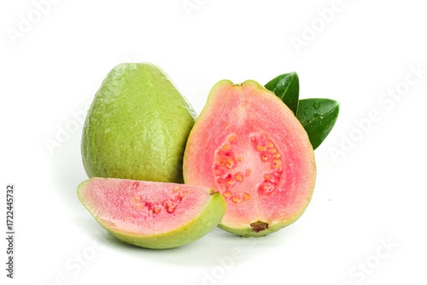 Fototapeta Fresh Pink Guava Fruit Sliced Open with Green Leaves on White Background - Guangxi Tropical Produce