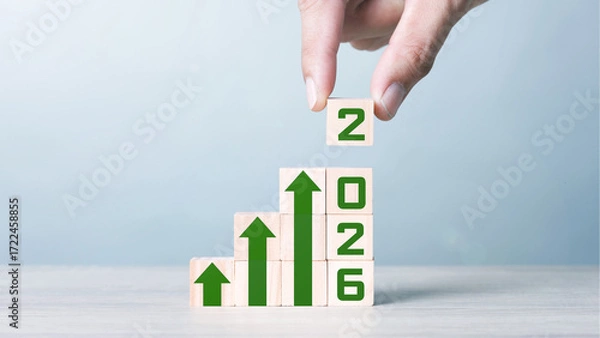 Fototapeta Wood block cubic stacking step up with Green Arrow Blue Tone. Business growth success process. Business Concept. Up Trend. 2026. Ratio  16:9