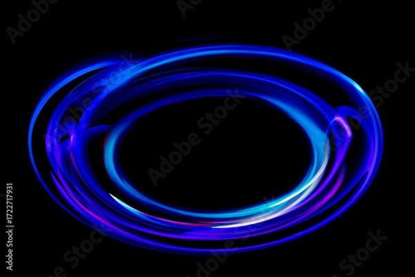 Obraz 黒バックの背景の中に光る青色のリング